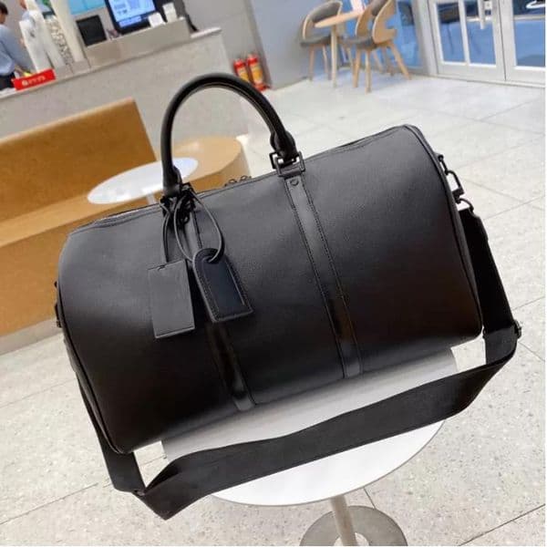 Top Quality New Men Duffle Bag Women Travel Bags Hand Luggage Travel Bags Men Pu Leather Handbags Large CrossBody Bags Totes 47CM
