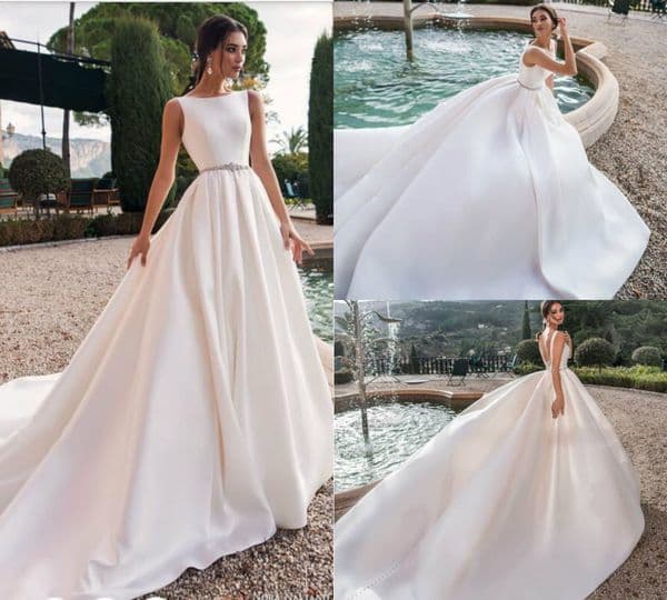Cheap Satin Dresses Sexy Backless Jewel Neck Sweep Train Beach Wedding Gowns Belt Crystal Beaded Plus Size Bohemian Bridal Dress