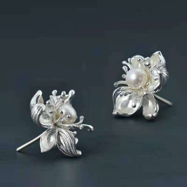 Three-dimensional design new silver inlaid pearl flower women's earrings exaggerated exquisite party jewelry accessories
