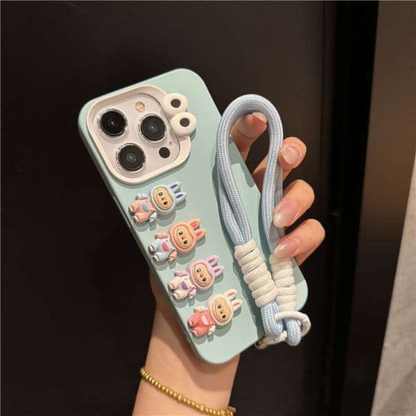 Cute 3D Cartoon Character iPhone Case with Wrist Strap, Shockproof Soft Silicone Cover Compatible with iPhone 16 Pro Max/15/14/13/12/11