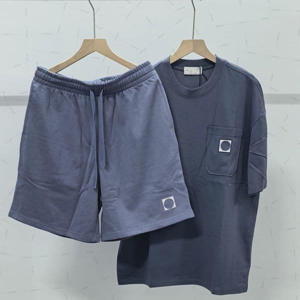 Mens tracksuits islanda short sleeve set designer tracksuits summer spliced badge wicking athleisure set