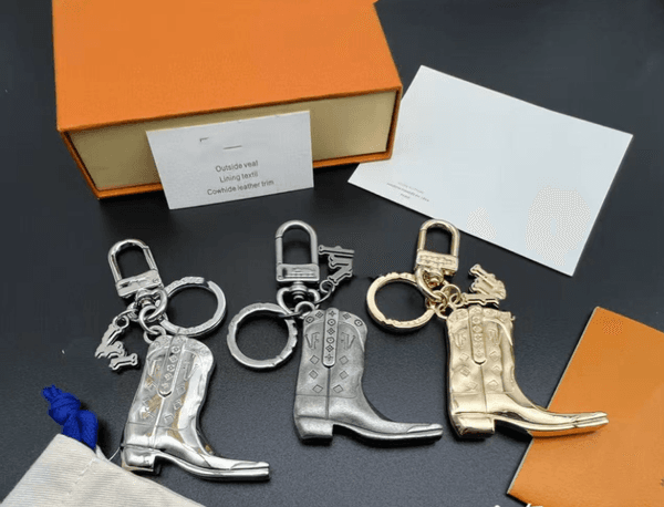 Cowboy Boot Pendant Chain Bag Charm fashion House designer gold sliver Snap fastener mens ladies keychain Holiday gift lovely quty L260525DTUO