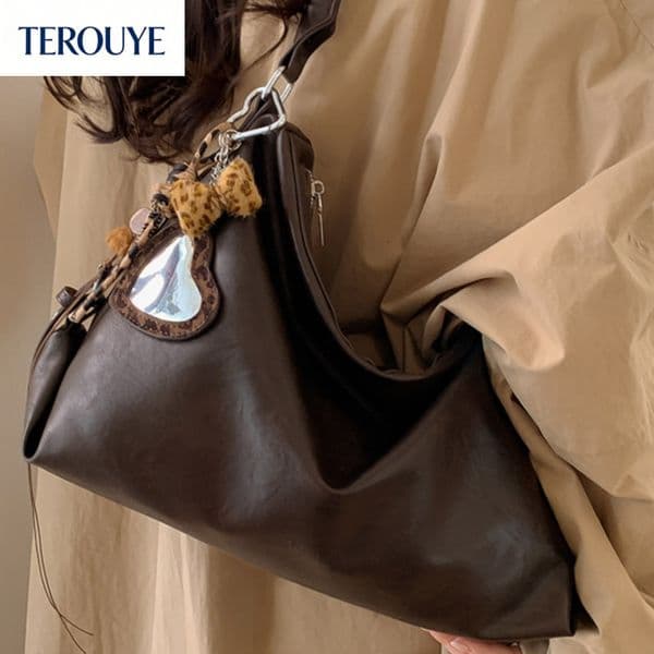 TEROUYE Korean retro large capacity design women's shoulder bag winter new casual simple texture handbag fashionable versatile style bag luxury bag bag Luxury bag