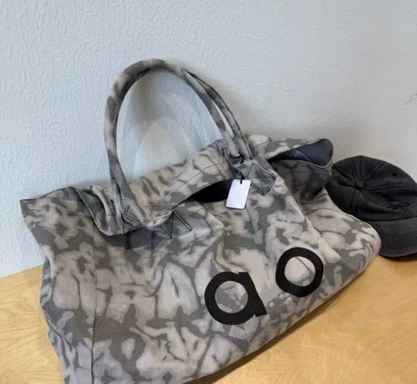 Master quality bag designer bag Luxury Women's canvas bag high-end yoga sports fitness bag large-capacity tote bag niche commuting shoulder handbag