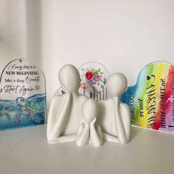 A family decorated wedding statue three people, perfect anniversary gift for husband and wife, newlyweds, or as an art 26H0122