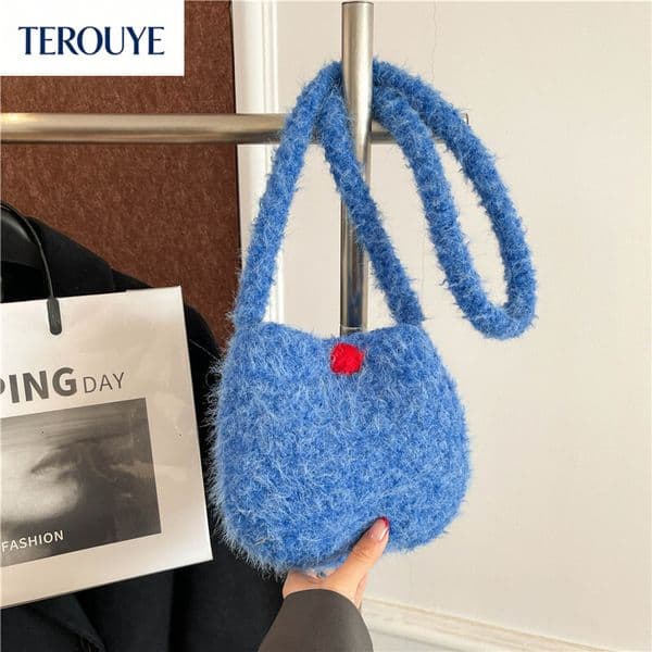 TEROUYE Korean style wool oval eggshell bag trend versatile popular prison style autumn and winter new mini women's shoulder bag bag