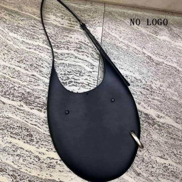 First-Layer Cowhide Egg-Shaped Armpit Bag, New Women's Niche Design Personalized Leather Metal Buckle Shoulder Crossbody Bag Suotong260127