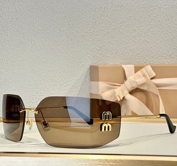 sunglases designer women sun glasses Trend Frameless Curved Surface Lens Glasses Women's Luxury cat eye shades Protect eyes mens designer sunglasse with box