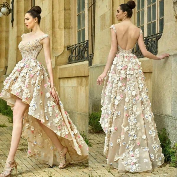 2026 Champagne Nude Prom Dresses Illusion Cap Sleeves Lace Crystal Beaded Hand Made Flowers Short Hi Lo Length Evening Gown Formal Wear Party Dress Backless