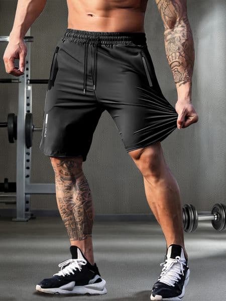 Mens solid color shorts with zipper pockets casual elastic drawstring shorts with a loose waist and high elasticity suitable 260226