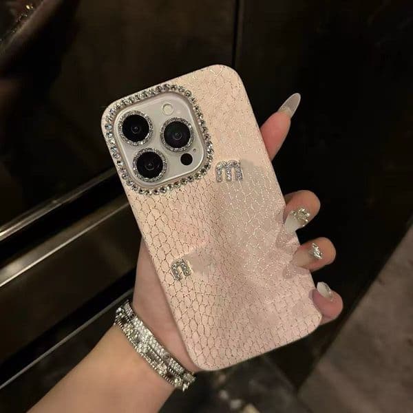 The designer has designed phone cases for the iPhone 16 Pro Max 15 Plus 14 13 12 Mini 11 and other models adopting the luxurious designer triangular back cover M56