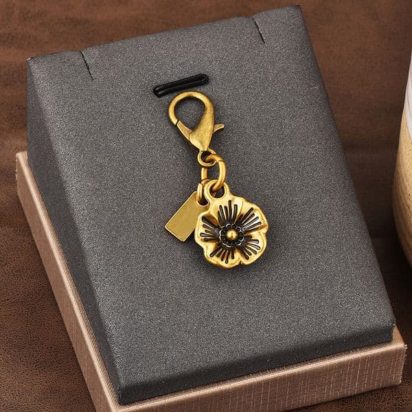 Golden Bear Cherry Four Leaf Clover Butterfly Pendant - Fashionable Bag Accessory for Schoolbags