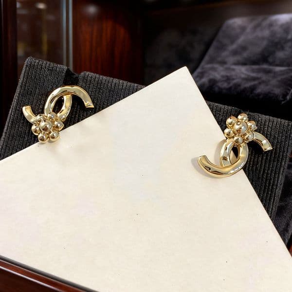designer jewelry cc earrings Small floral smooth surface earrings channels earring