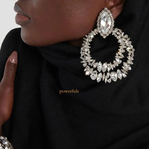 The shiny crystal double-ring exaggerated round hoop earrings, for ladies, are bold and eye-catching circular earrings that showcase individuality.