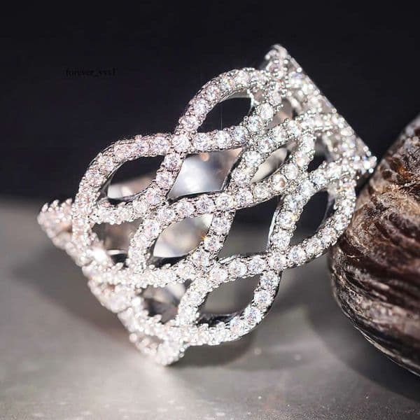 new Silver-plated design ring women featuring wave-like cash-wrapping design micro-inlaid Moissanite for a sparkling band