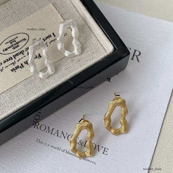 Hong Kong-style Luxury Jewelry retro chic 925 sterling silver irregular streamlined hollow stud for women trendy and versatile earrings