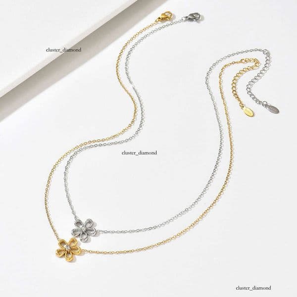Moissanite Jewelry two-tone daisy necklace with diamonds gold and steel contrasting colors fine chain design exquisite flower pendant