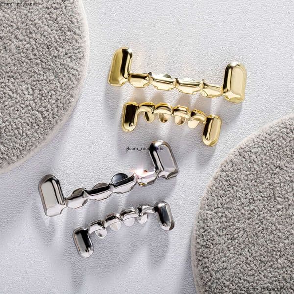Jewelry HIPHOP gold-plated tooth braces teardrop-shaped smooth surface small tiger teeth personalized rap fashion accessories wholesale