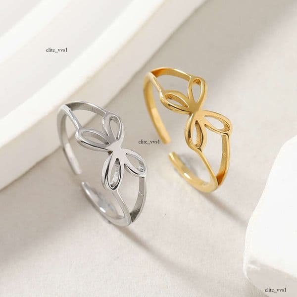 Sterling Silver 14K 18K Gold jewelry simple cut bow-shaped four-petal adjustable titanium steel ring manufacturer