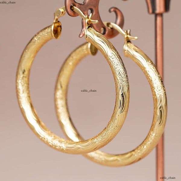 hot-selling wholesale ring-shaped jewelry wavy pattern French-style earrings Middle Eastern earrings