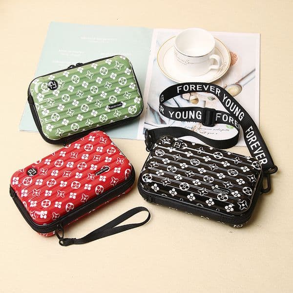 Cross-border best-selling crossbody bag, portable PC hard shell storage makeup bag, logo luggage bag, waterproof new toiletry bag 587