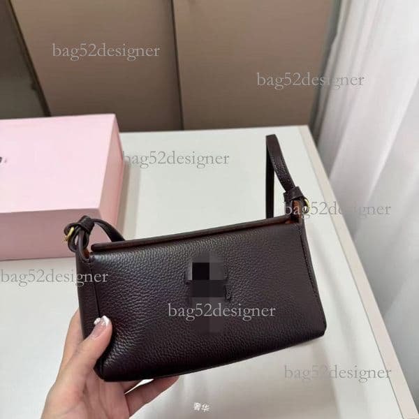 Designer bag Luxury bag Miu New Holder Retro Simple Handheld Women S Versatile Fashionable Single Shoulder Lightweight Pen Case Underarm Bag