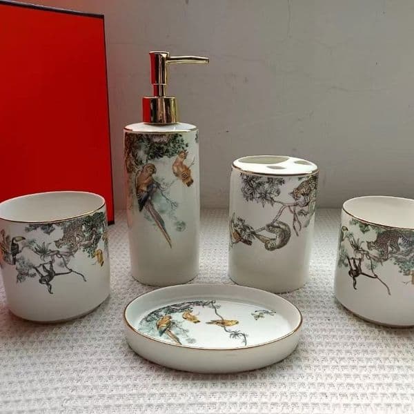 Elegant Five-Piece Bathware Collection Featuring a Unique Ceramic Mouth Wash Container
