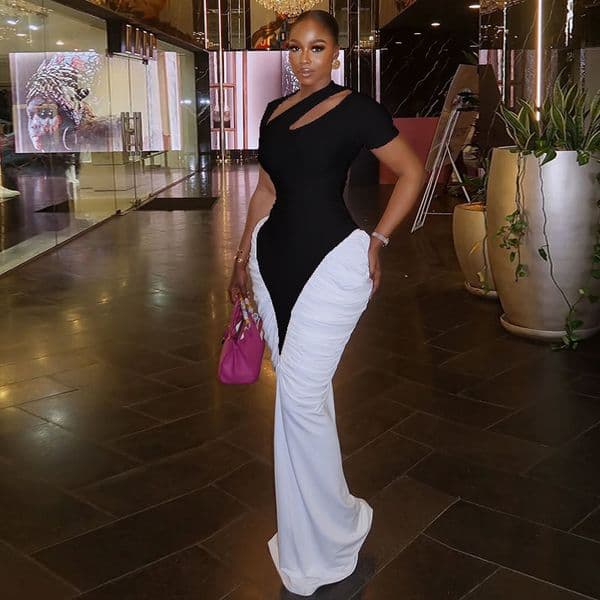 Black and white womens dress with contrasting colors slim-fit design bodycon skirt hollow-out details versatile street style short-sleeved long dress