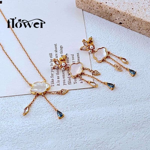 New fashionable light-luxury niche natural shell cloud-shaped zircon inlaid multi-drop metal earrings and necklace