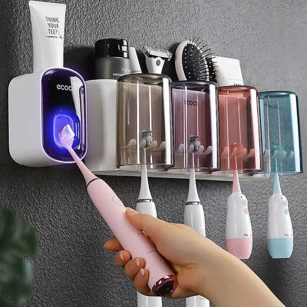 ECOCO Bathroom Toothbrush Holder Organizer with Cup Toothpaste Squeezer Dispenser Wall Storage Rack Bathroom Accessories Shelf 260506