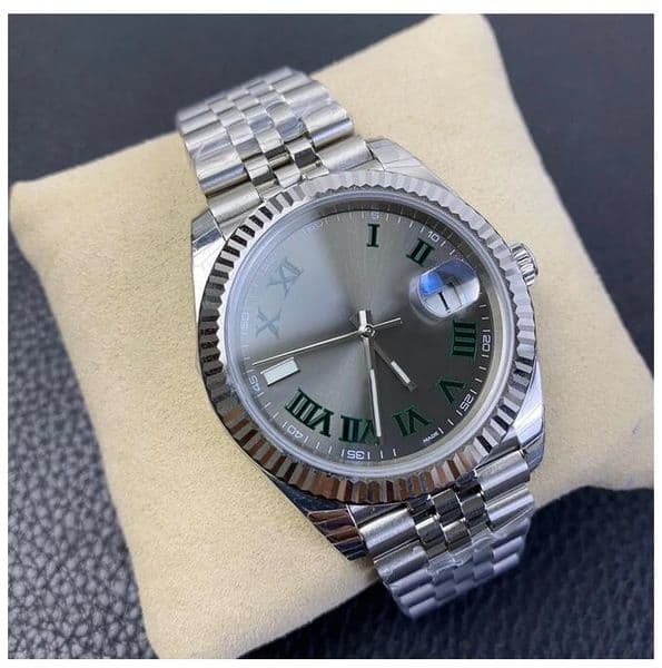 Luxury men's automatic watch, 41mm case diameter, fluted bezel, grey dial, date display, green Roman numeral hour markers, sapphire crystal.