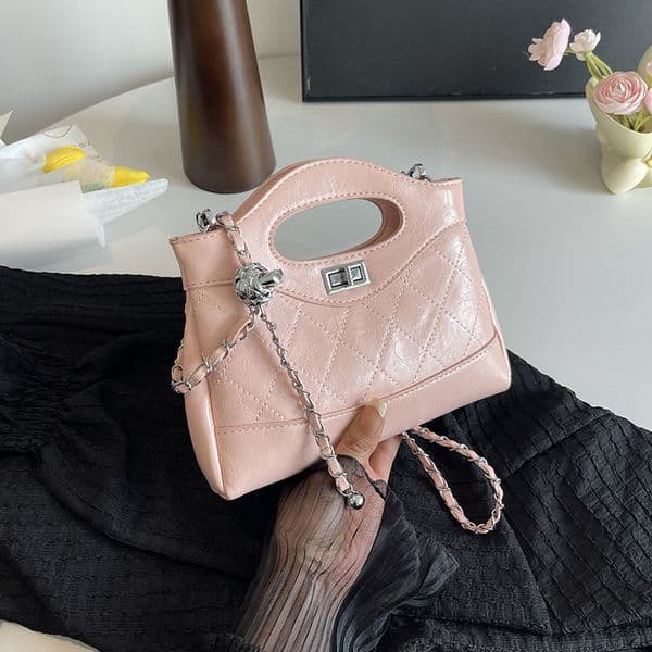 designer luxury 2026 New Lingge Small Fragrant Wind Chain Lock Small Golden Ball Niche Design Versatile Handheld Shoulder Bag High-end look