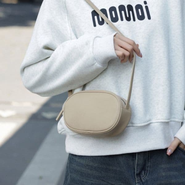 Minimalist Style Genuine Leather Phone for Women 2025 New Versatile Cowhide Small Oval Niche Crossbody Shoulder Bag