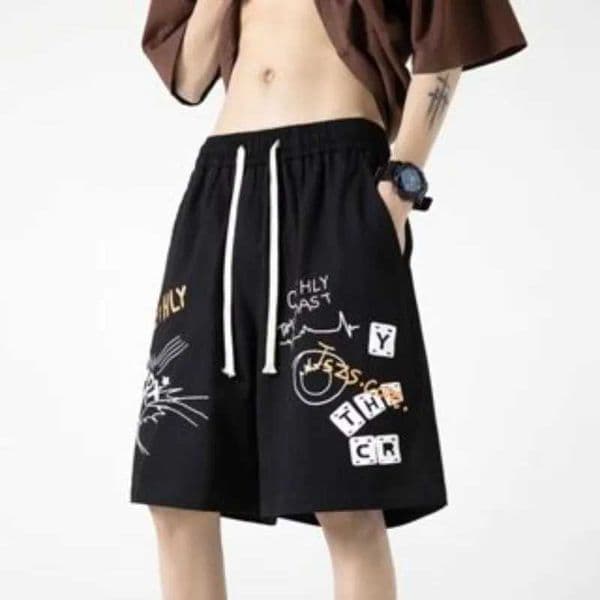 M-8XL Three color mens plus size loose American hip-hop graffiti printed casual pants fashionable sports pants L260513