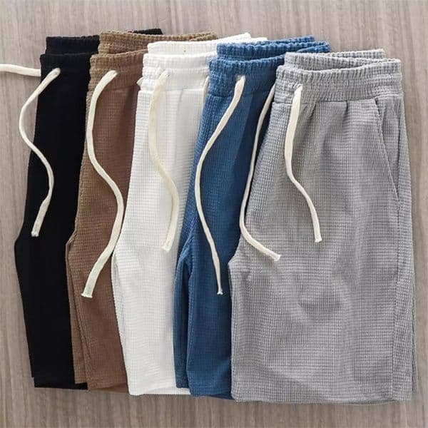 Men Shorts Solid Color Mid Waist Summer Motion Waffle Texture Deep Crotch Drawstring Male Shorts Loose Knee Length Casual Short 260512
