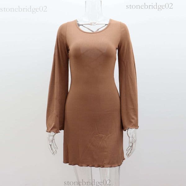 European and American women's new autumn and winter sexy long-sleeve round-neck dress, solid color bell-sleeve, back cutout with straps, A-line short dress aae