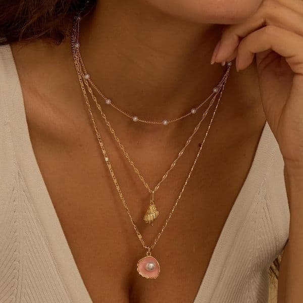 High Quality titanium steel floral ocean-style shell, starfish, and pearl necklace, vacuum electroplated with 18K gold for color retention