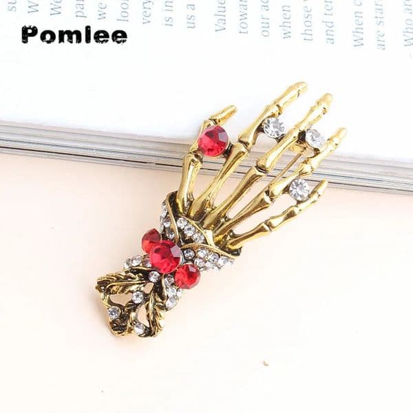 Pomlee Arrival Skull Hand Brooch Unisex Punk Pin Antil Gold Red Rhinestone Brooch Gift Clip Accessories Whosales 260515