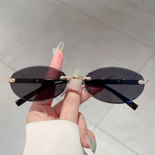 Personalized Oval Frame Sunglasses Retro Women Men Metal High-end Sunglasses Luxuy Frameless Trimming Traveling UV400 Sunglasses C260525