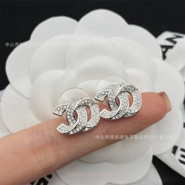 designer cc earrings Pair of Double C Small Full Diamond Cross Earrings for Women Fashionable and Simple Earrings for Women channels channeled diamond