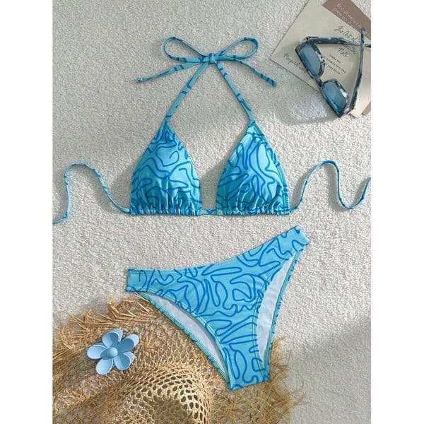 The blue striped bikini design fashionable individual the halterneck tie can be adjusted freely and it is a must-ha 26L0530