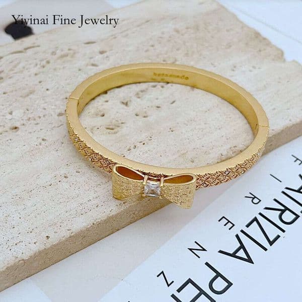 New fashionable, light-luxury, cute and sweet textured bow-shaped metal bracelet with zircon inlay for women