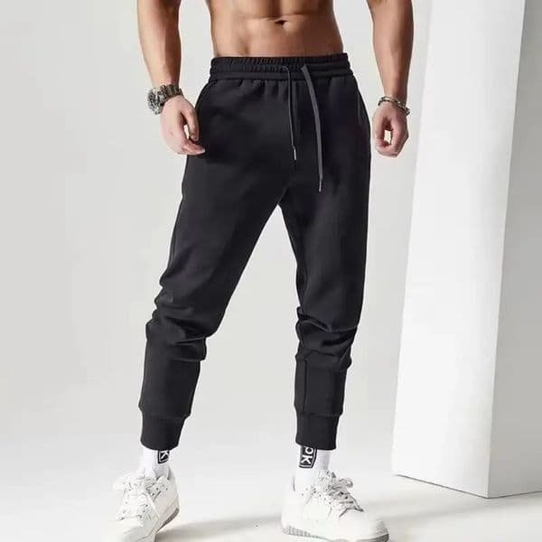 Mens Casual Sweatpants Sports Pants Unisex Fashion Solid Loose Trousers Streetwear Autumn Winter Jogging Fitness 260331