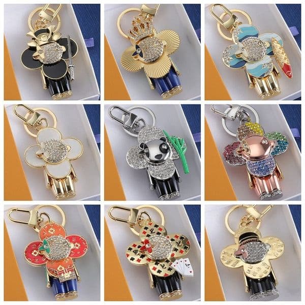 Luxury Keychains Fashion Bag Charm Pendant Designer Keyrings Car Key Holder for Mens Womens Couple Diamonds Sparkle Stainless Steel Key Chain with Logo Top Quality