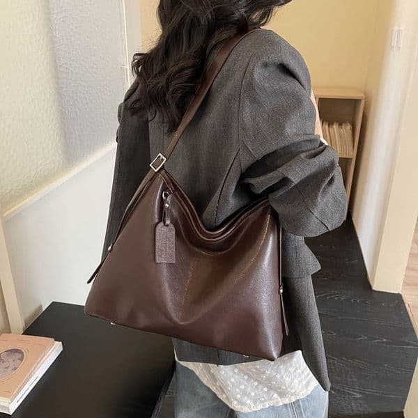 This year's popular women's the 2026 new vintage large-capacity tote bag, which has high-end feel and is versatile as a shoulder or crossbody bag