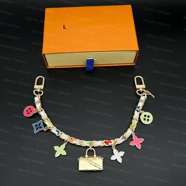 Designer bag charm Fashionable Gold Chain Pink Flower Charm, Vintage Trunk Pendant & Letter Decor Versatile Bag Accessory for Ladies with box