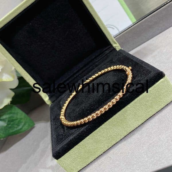 Designer Bangle Clover Brand Fanjia fourleaf clover bead bracelet 18K goldplated with a rolling bead design simple bead edge finely crafted highquality version ZBE