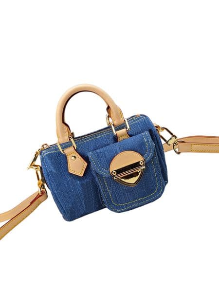 This designer bag features an elegant snap lock on the front pocket, making it convenient to access small valuables.
