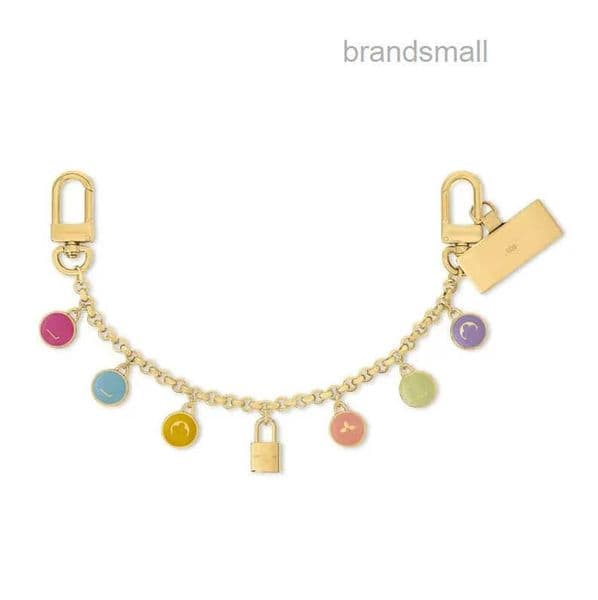 Luxury metal Paris V Confetti Chain Bag Charm fashion chain House designer classic gold keychain Snap fastener mens ladies keychain Holiday gift Phone Holder