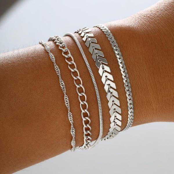 Elegant Silver-Toned Spiraled Chains with Heart Motifs Versatile Layering Bracelet Ensemble